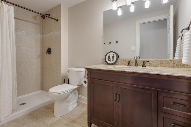 22709 Stanford Dr, Frankfort, IL 60423 - bathroom featuring toilet, vanity, a tile shower, and baseboards