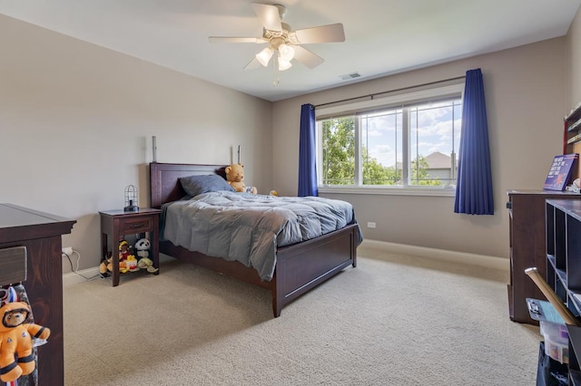 22709 Stanford Dr, Frankfort, IL 60423 - bedroom with baseboards, light colored carpet, and a ceiling fan