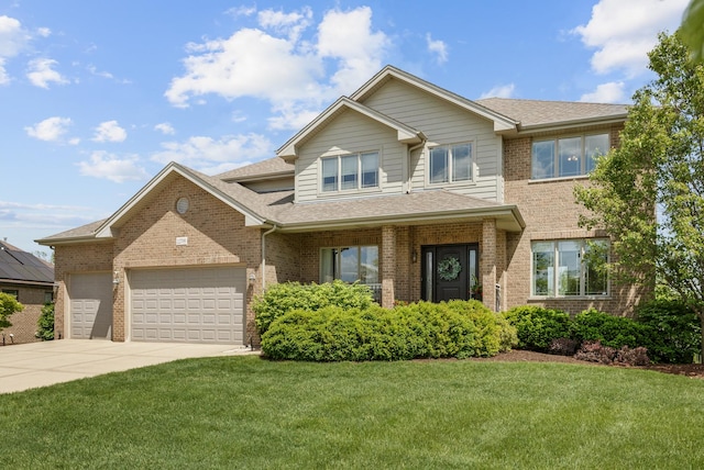 22709 Stanford Dr, Frankfort, IL 60423 - view of front of home featuring brick siding, a front lawn, and a garage