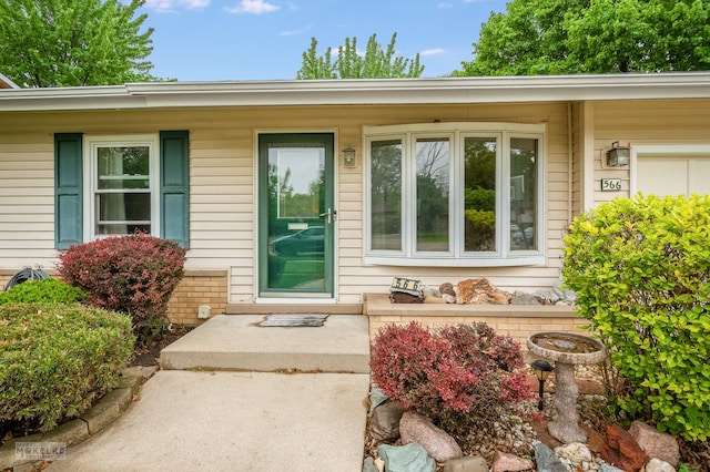 566 Ridge Ave, Elk Grove Village, IL 60007 - doorway to property featuring covered porch