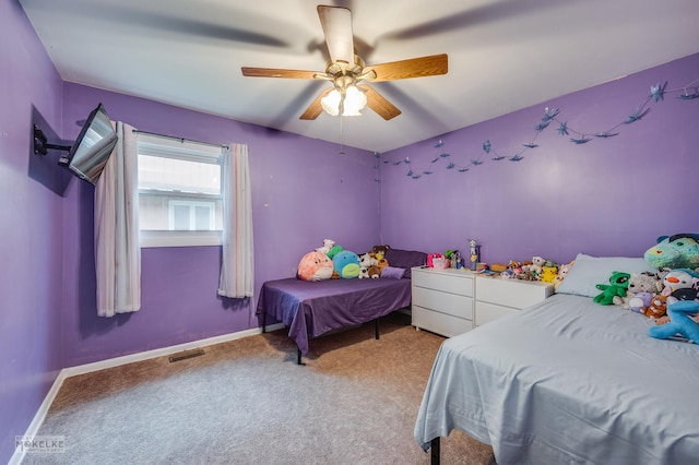 566 Ridge Ave, Elk Grove Village, IL 60007 - bedroom with light colored carpet, a ceiling fan, and baseboards