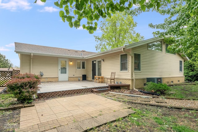 566 Ridge Ave, Elk Grove Village, IL 60007 - rear view of property featuring a deck, a patio area, and central AC