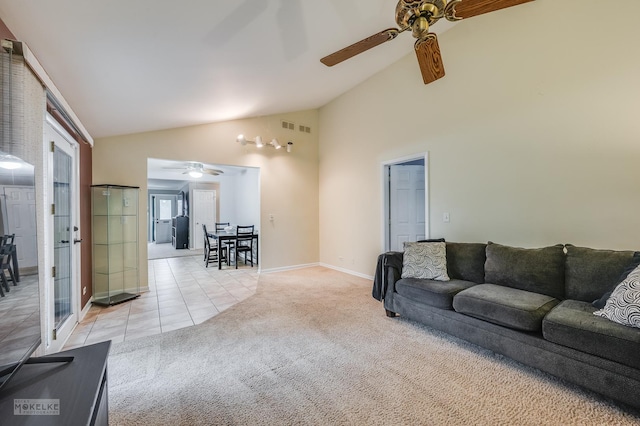 566 Ridge Ave, Elk Grove Village, IL 60007 - living area featuring ceiling fan, lofted ceiling, light colored carpet, baseboards, and light tile patterned floors