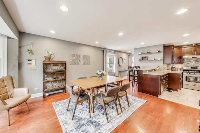 1524 Cleveland St, Evanston, IL 60202 - dining area with light wood-style flooring, recessed lighting, and baseboards