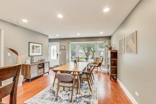 1524 Cleveland St, Evanston, IL 60202 - dining area with light wood-style flooring, recessed lighting, and baseboards