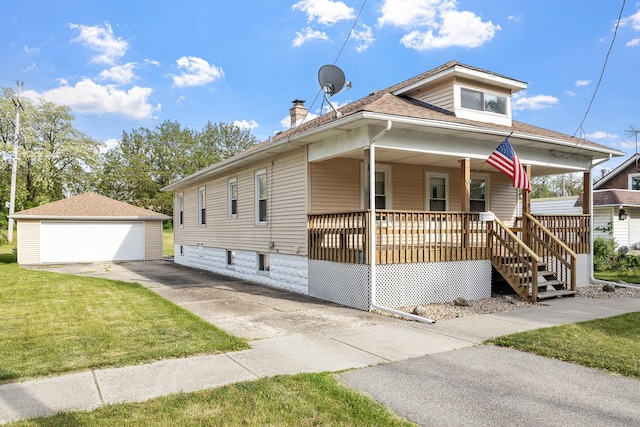 610 Clinton St, Lockport, IL 60441 - view of front of property featuring covered porch, a detached garage, an outbuilding, a front lawn, and roof with shingles