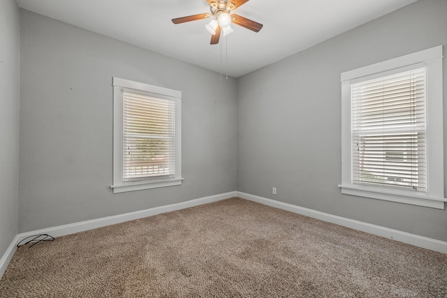610 Clinton St, Lockport, IL 60441 - spare room with carpet flooring, ceiling fan, and baseboards
