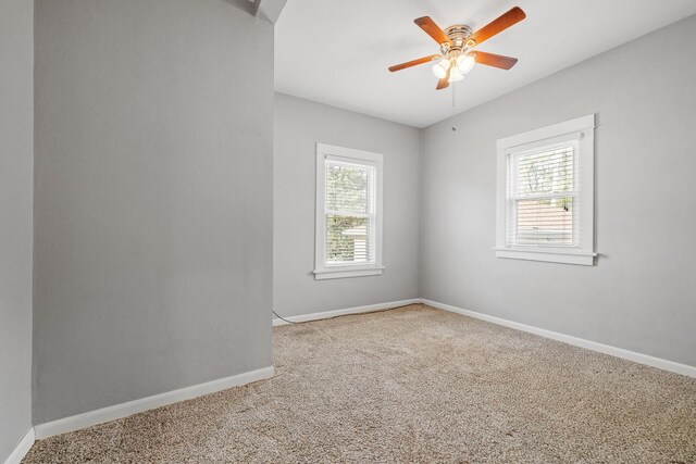 610 Clinton St, Lockport, IL 60441 - carpeted spare room with baseboards and a ceiling fan