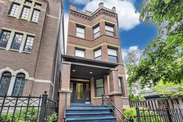 2336 W Roscoe St Unit 3R, Chicago, IL 60618 - view of front of home with french doors and brick siding