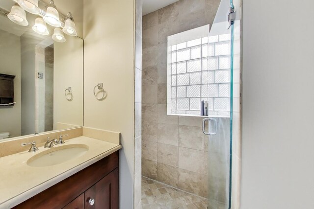 2336 W Roscoe St Unit 3R, Chicago, IL 60618 - full bath with vanity, a stall shower, and toilet
