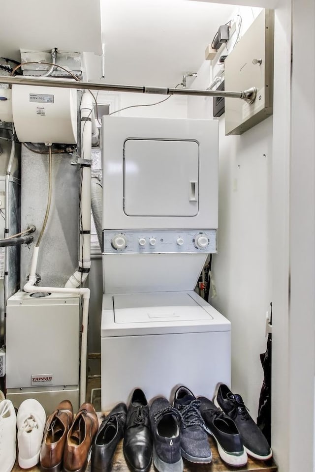 2336 W Roscoe St Unit 3R, Chicago, IL 60618 - washroom with stacked washer / dryer