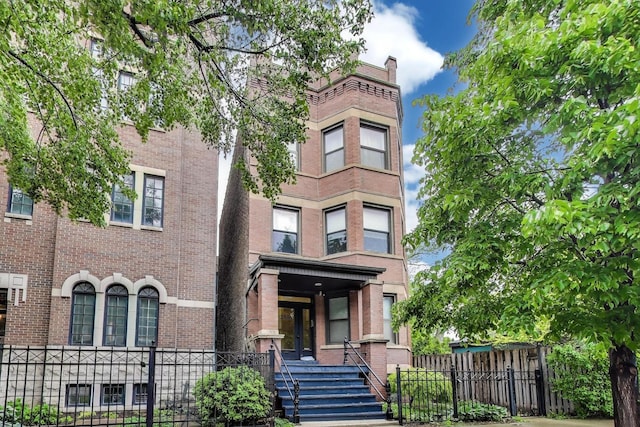 2336 W Roscoe St Unit 3R, Chicago, IL 60618 - view of front of property with brick siding