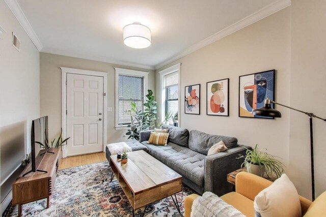 2336 W Roscoe St Unit 3R, Chicago, IL 60618 - living area with wood finished floors and crown molding