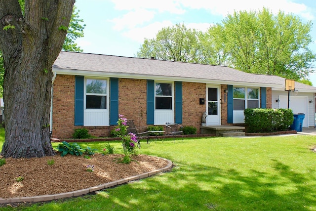 818 Edwin Dr, Bourbonnais, IL 60914 - single story home featuring brick siding, an attached garage, a front yard, and a shingled roof