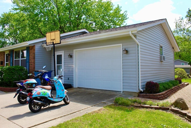 818 Edwin Dr, Bourbonnais, IL 60914 - view of home's exterior featuring driveway and a garage