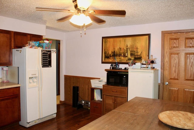 818 Edwin Dr, Bourbonnais, IL 60914 - dining area with a ceiling fan, dark wood-style floors, a textured ceiling, and wainscoting