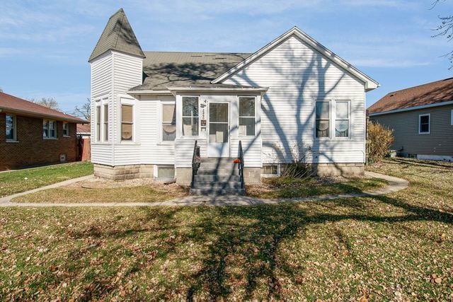 2460 Indiana Ave, Lansing, IL 60438 - view of front of home featuring a front yard and entry steps
