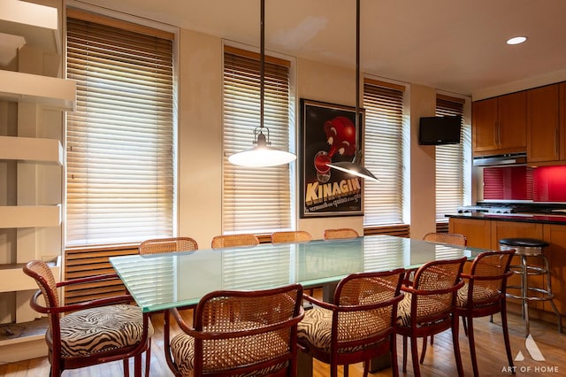 11333 S Langley Ave, Chicago, IL 60628 - dining area with wood finished floors and recessed lighting