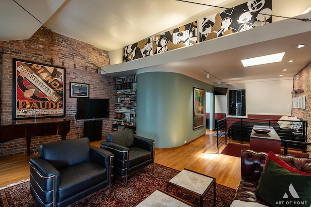 11333 S Langley Ave, Chicago, IL 60628 - living area featuring wood finished floors and brick wall