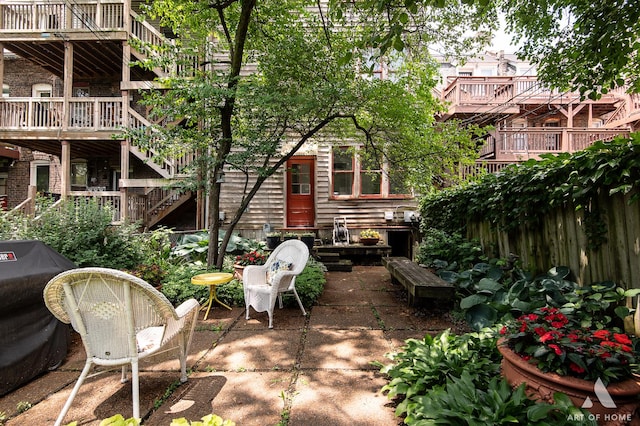 11333 S Langley Ave, Chicago, IL 60628 - view of patio featuring stairs and a grill