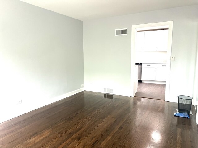 9109 Lamon Ave Unit 2N, Skokie, IL 60077 - unfurnished room featuring dark wood-style flooring