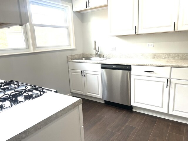 9109 Lamon Ave Unit 2N, Skokie, IL 60077 - kitchen featuring dishwasher, a sink, white cabinets, dark wood finished floors, and light countertops