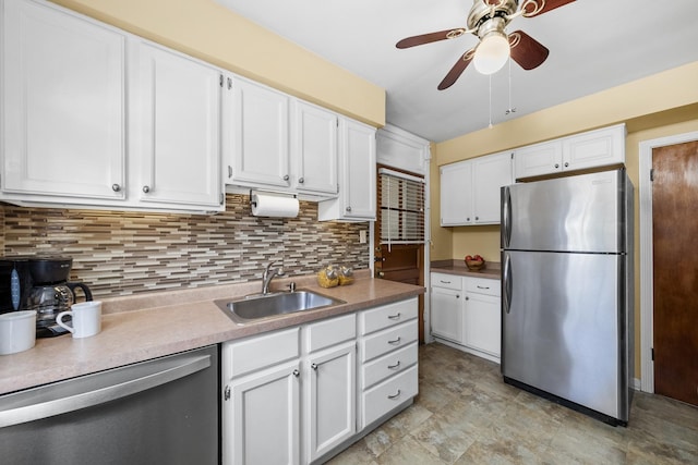 213 N Marion St Unit 2D, Oak Park, IL 60302 - kitchen with stainless steel appliances, a sink, white cabinetry, and a ceiling fan