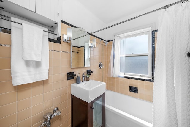213 N Marion St Unit 2D, Oak Park, IL 60302 - full bathroom featuring vanity, shower / bathtub combination with curtain, and tile walls