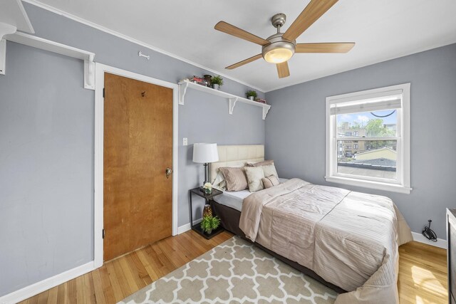 213 N Marion St Unit 2D, Oak Park, IL 60302 - bedroom featuring wood finished floors, baseboards, and a ceiling fan