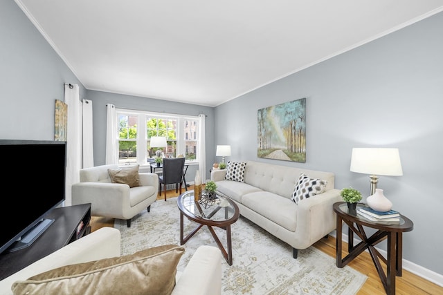 213 N Marion St Unit 2D, Oak Park, IL 60302 - living room with crown molding, light wood-type flooring, and baseboards