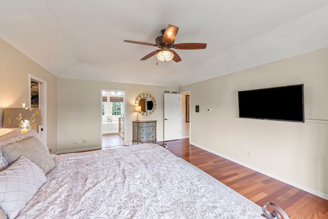 13187 Briar Patch Ln, Lemont, IL 60439 - bedroom with wood finished floors, baseboards, connected bathroom, lofted ceiling, and a ceiling fan