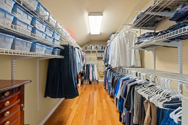 13187 Briar Patch Ln, Lemont, IL 60439 - walk in closet featuring wood finished floors and lofted ceiling