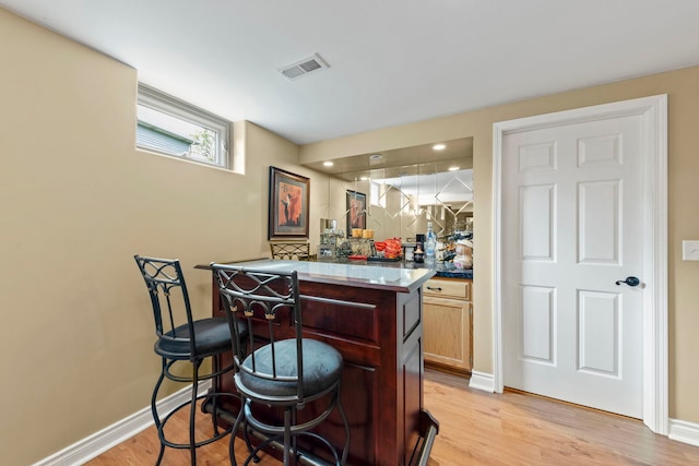 13187 Briar Patch Ln, Lemont, IL 60439 - indoor dry bar with light wood finished floors and baseboards