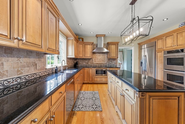 13187 Briar Patch Ln, Lemont, IL 60439 - kitchen featuring built in appliances, wall chimney range hood, a sink, light wood finished floors, and a center island
