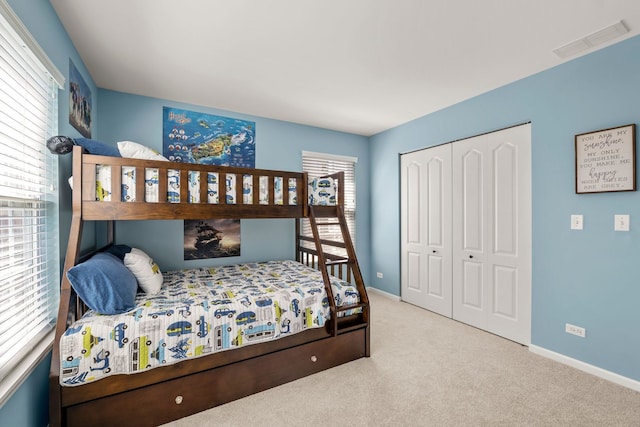 210 Station Park Cir, Grayslake, IL 60030 - carpeted bedroom featuring a closet and baseboards