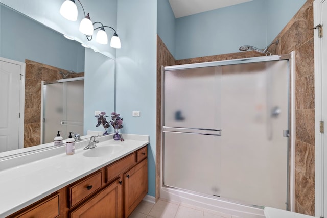 210 Station Park Cir, Grayslake, IL 60030 - bathroom featuring a stall shower, vanity, and tile patterned flooring