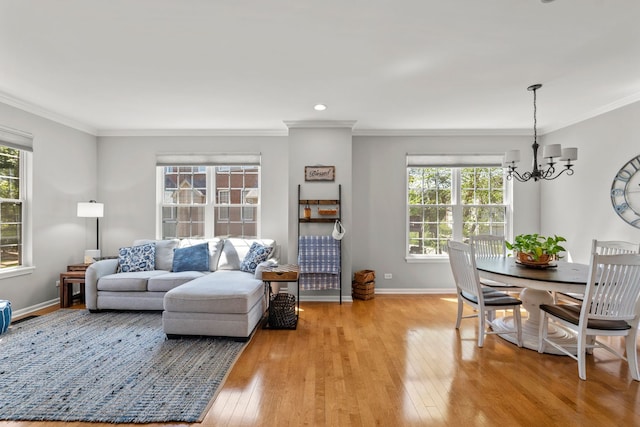 210 Station Park Cir, Grayslake, IL 60030 - living room featuring light wood-type flooring, ornamental molding, a chandelier, baseboards, and recessed lighting