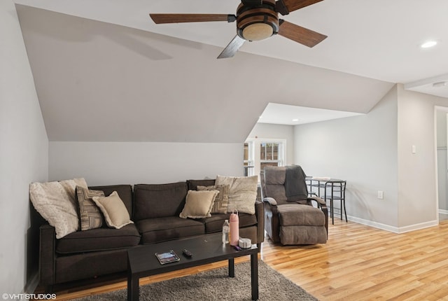living room with wood finished floors, lofted ceiling, a ceiling fan, baseboards, and recessed lighting
