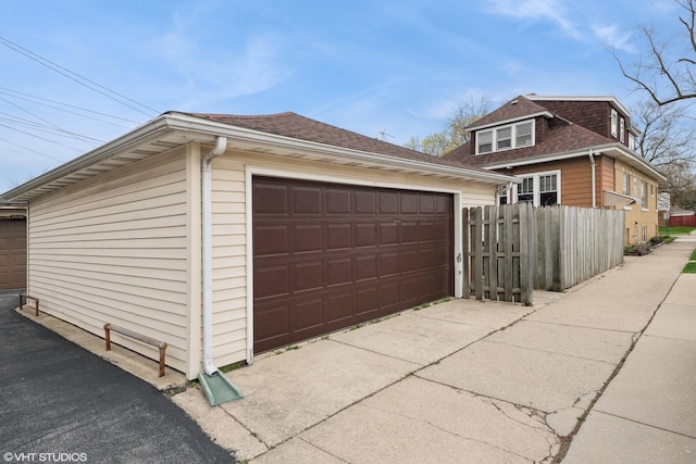 detached garage with fence