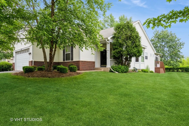 1520 Mansfield Dr, Aurora, IL 60502 - obstructed view of property featuring a front yard and a garage