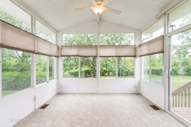 1520 Mansfield Dr, Aurora, IL 60502 - unfurnished sunroom featuring a ceiling fan, vaulted ceiling, and view of scattered trees