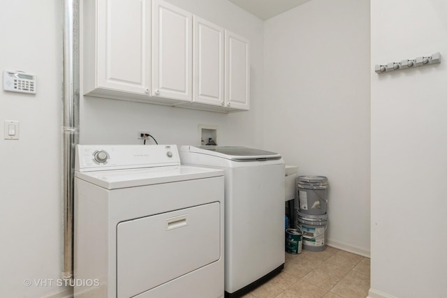 1520 Mansfield Dr, Aurora, IL 60502 - washroom with independent washer and dryer, cabinet space, and light tile patterned floors
