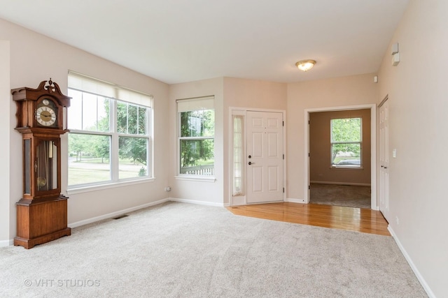 1520 Mansfield Dr, Aurora, IL 60502 - carpeted entryway featuring baseboards
