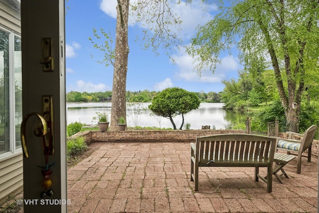 145 W Lake Shore Dr, Tower Lakes, IL 60010 - view of patio with a water view