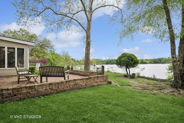 145 W Lake Shore Dr, Tower Lakes, IL 60010 - view of green lawn featuring a water view and a patio area