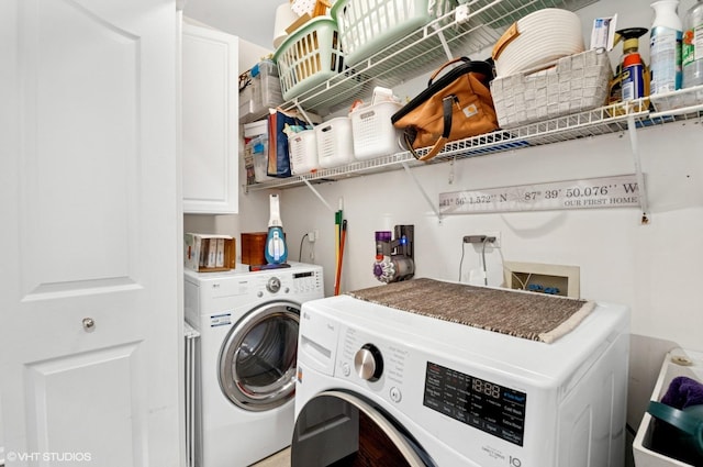 2842 N Southport Ave Unit 2, Chicago, IL 60657 - laundry area with cabinet space and separate washer and dryer