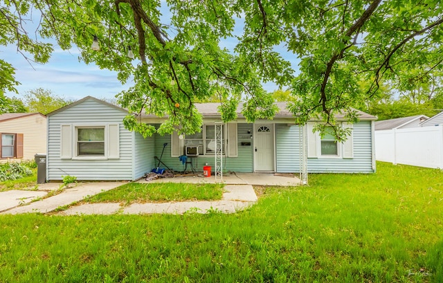 single story home featuring a porch and cooling unit