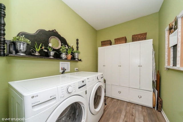 1200 Ardmoor Dr, Crystal Lake, IL 60012 - laundry room with wood finished floors, cabinet space, washing machine and clothes dryer, and baseboards