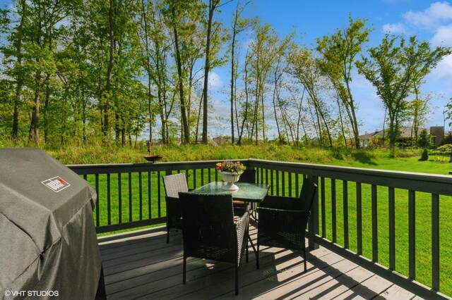 1200 Ardmoor Dr, Crystal Lake, IL 60012 - wooden deck featuring grilling area, outdoor dining space, and a yard