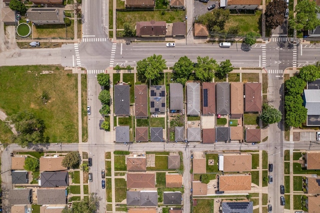 aerial view of property's location featuring nearby suburban area